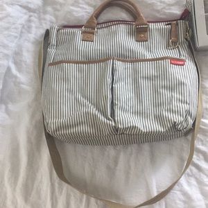Skip hop duo diaper bag/ Burt’s bees onesie